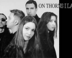 На фото On Thorns I Lay